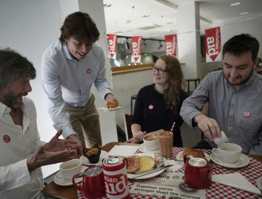 Volunteers and staff enjoy a Big Brekkie